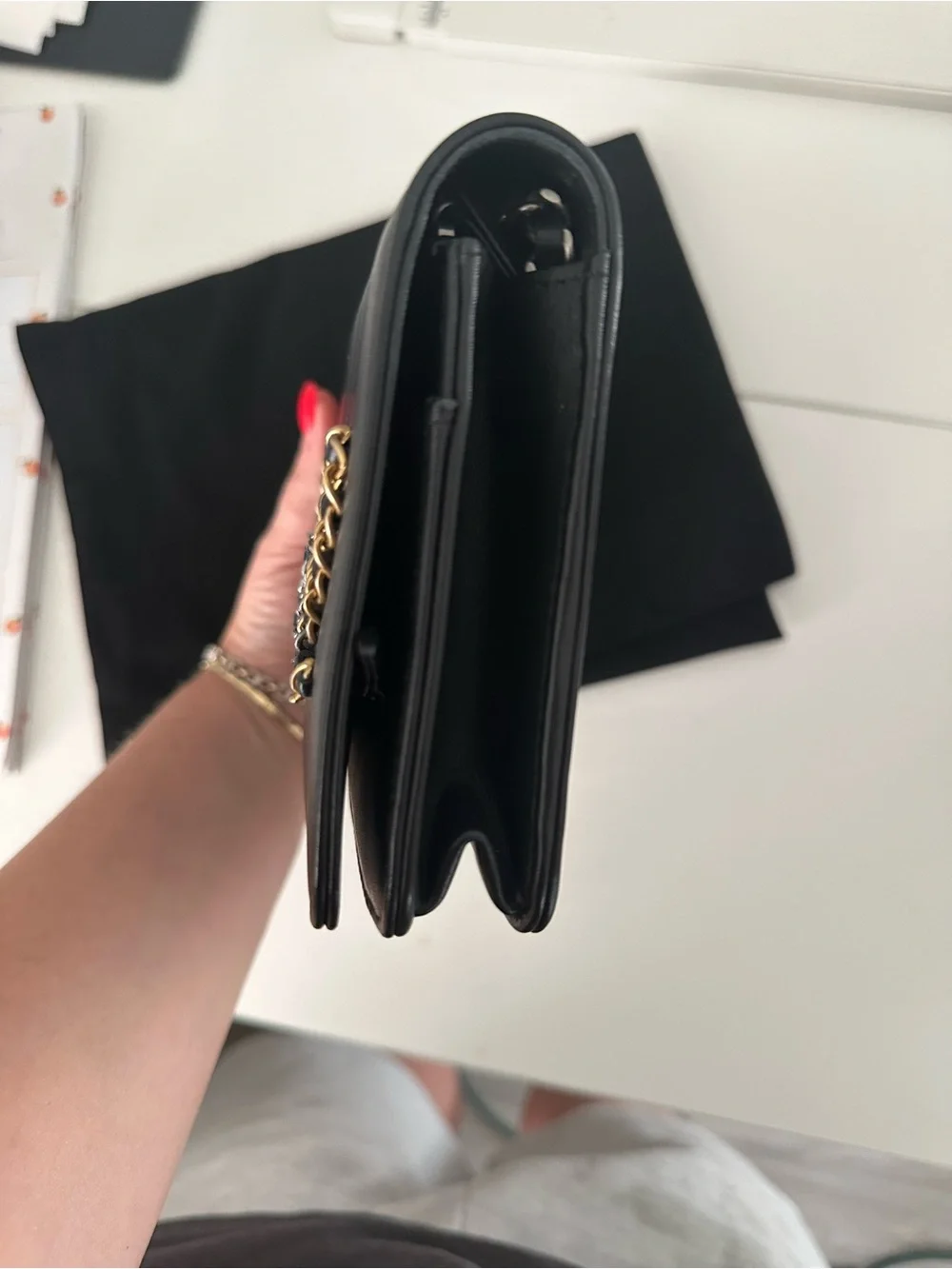 CHANEL Black Leather Clutch with Mixed Metal Chain Script